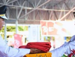 Pj Bupati Barito Utara Pimpin Upacara Penurunan Bendera Merah Putih