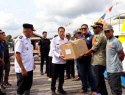 Pj Bupati Barut Tinjau Lokasi Banjir di Dua Kecamatan Sekaligus Salurkan Bantuan